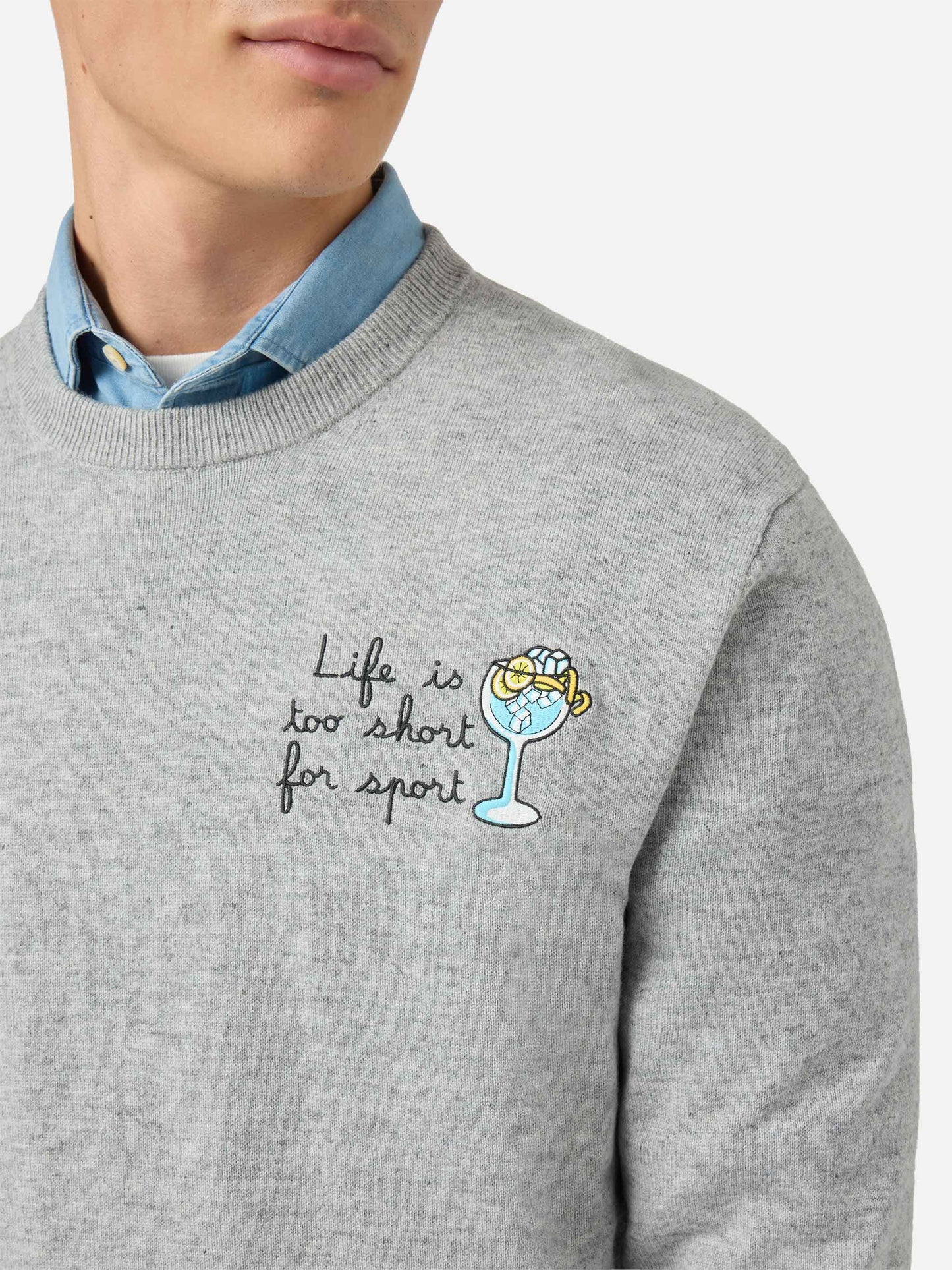 Crewneck-genser Heron Light med broderiet "Life is too short for sport" – produktbilde